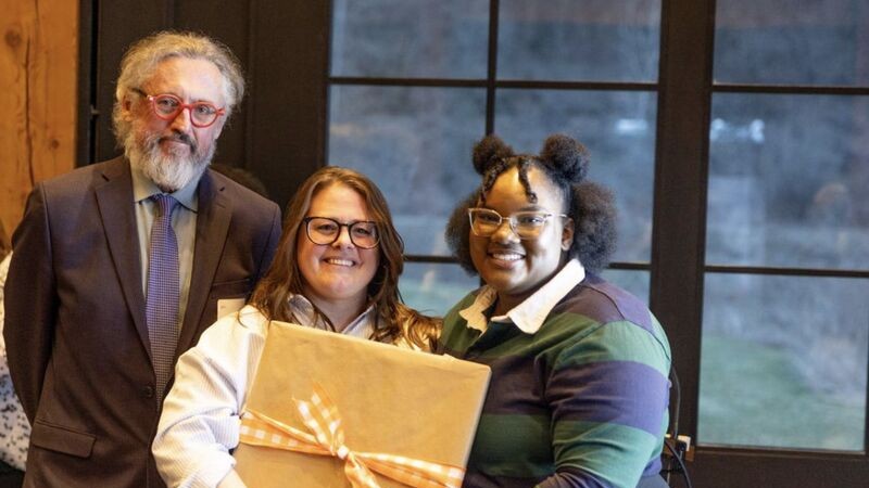 Dean Hall, Abby and Shakira as she is presented with a wrapped gift.