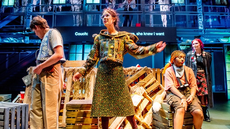 Theater performers on stage in costumes designed by industrial designer Emily Ohl.