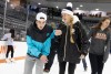 two people ice skating.