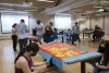 students making no-sew fleece blankets.