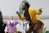 actors on stage portraying a scene from The Tempest.