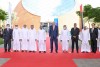 Dubai and RIT officials lined up in front of RIT Dubai campus.