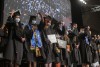 Graduates move their tassels to the left at the end of the ceremony.
<br><p>Photo by A. Sue Weisler</p>