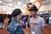 Jared Lee, a first-year computer engineering student, tries on his balloon hat at the Resource Fair.
<br><p>Photo by A. Sue Weisler</p>