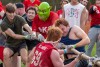 Phi Kappa Psi’s Michael Perez-Gelinas wears a mask of the animated character Shrek during Mud Tug 2022.
<br><p>Photo by Carlos Ortiz</p>