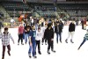 group of college students ice skating.