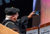 RIT President Bill Sanders takes a selfie with the crowd, a new Fall Convocation for New Students tradition. 