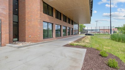 Walter Muench Patio outside of a brick building.