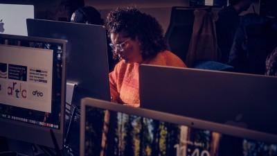 A student works at a computer.
