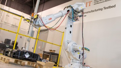 ABB large cobot working on EV battery disassembly