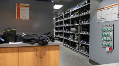 shelves full of camera equipment.