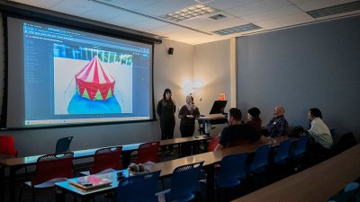 students show a 3 D tent on a screen.