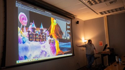 students show a 3 D candy castle on a screen.