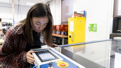 A student works in the Fab Lab.