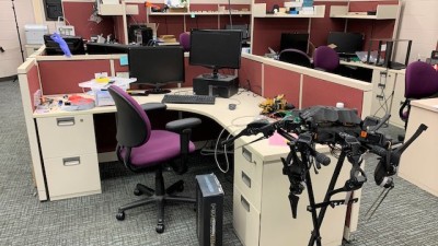 Desk stations with computers at each. 