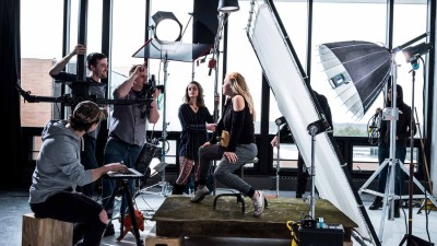 A group of people in a photoshoot.