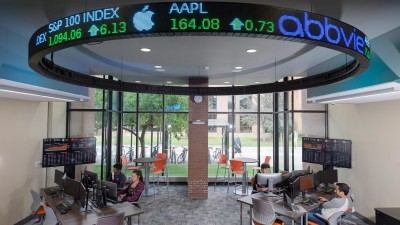 Stock lab with a circular stock ticker on the ceiling