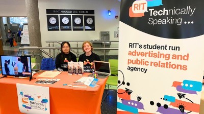 two students at a table during imagine RIT representing Technically Speaking