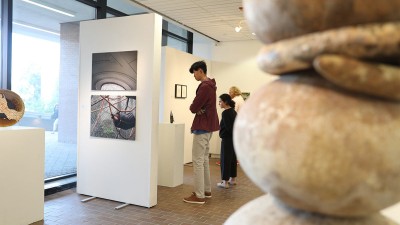Students view work in Bevier Gallery. 