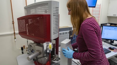 student working with equipment in imaging lab.
