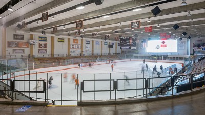Students playing hockey.