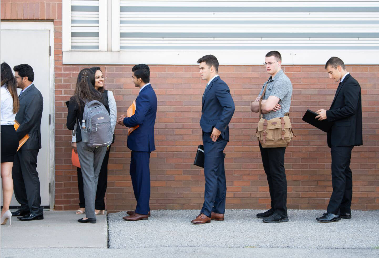 R I T students standing in line at a career fair on campus.
