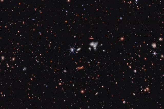 stars in space with circular and oblong shapes.