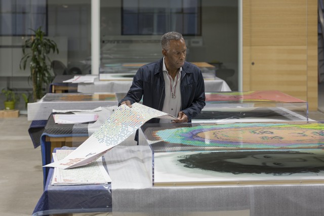 Charles Gaines works in his studio.