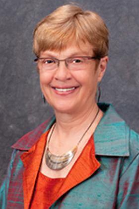 Headshot of doctor Carolyn J Lukensmeyer.