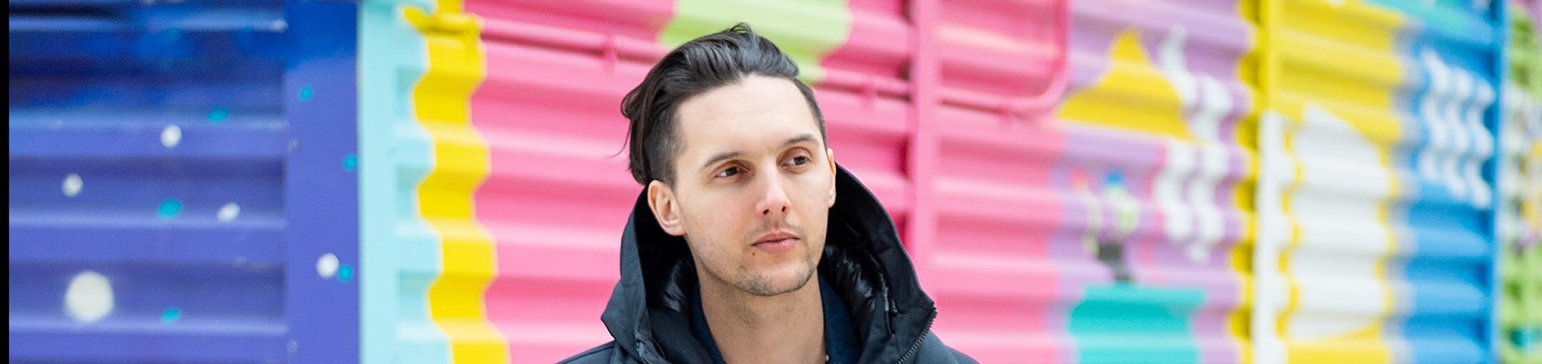 A small group of people working on the robofish at a workspace