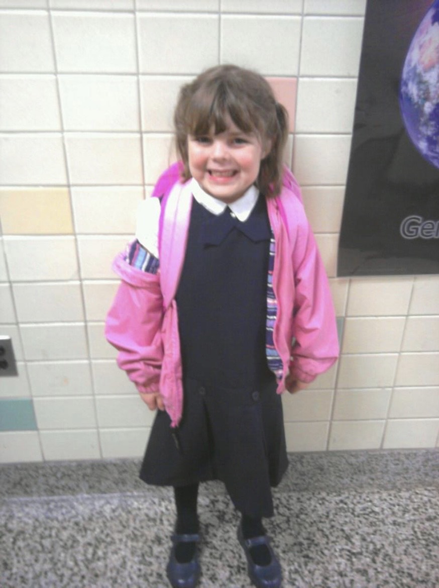 three year old girl smiling