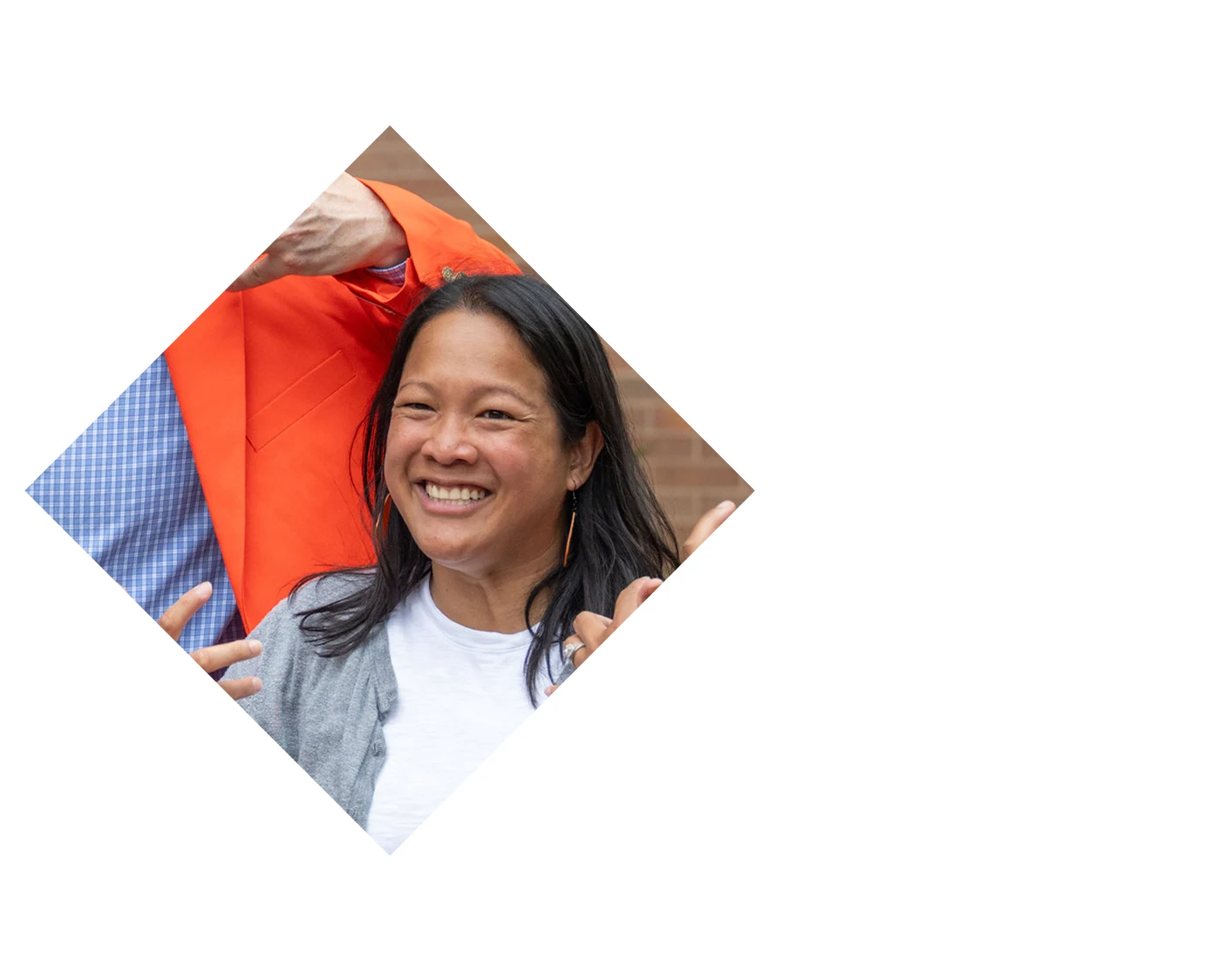 green tinted background of a group of people working on something