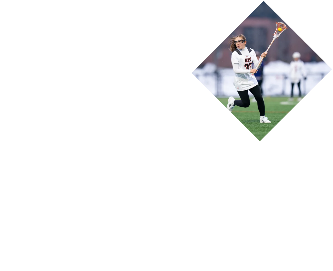 Two people reviewing a digital image of a human skeleton on a computer screen