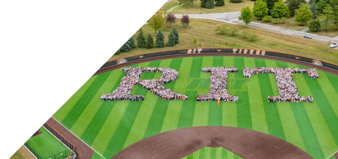 Arial shot of students shaped as the letters R I T