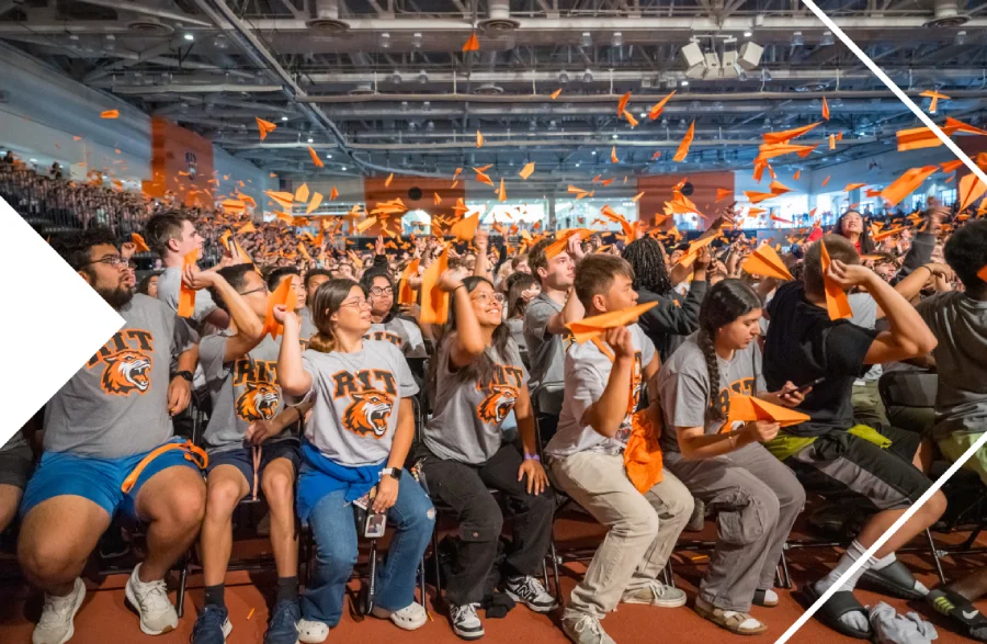 Students dancing and celebrating at a pep rally