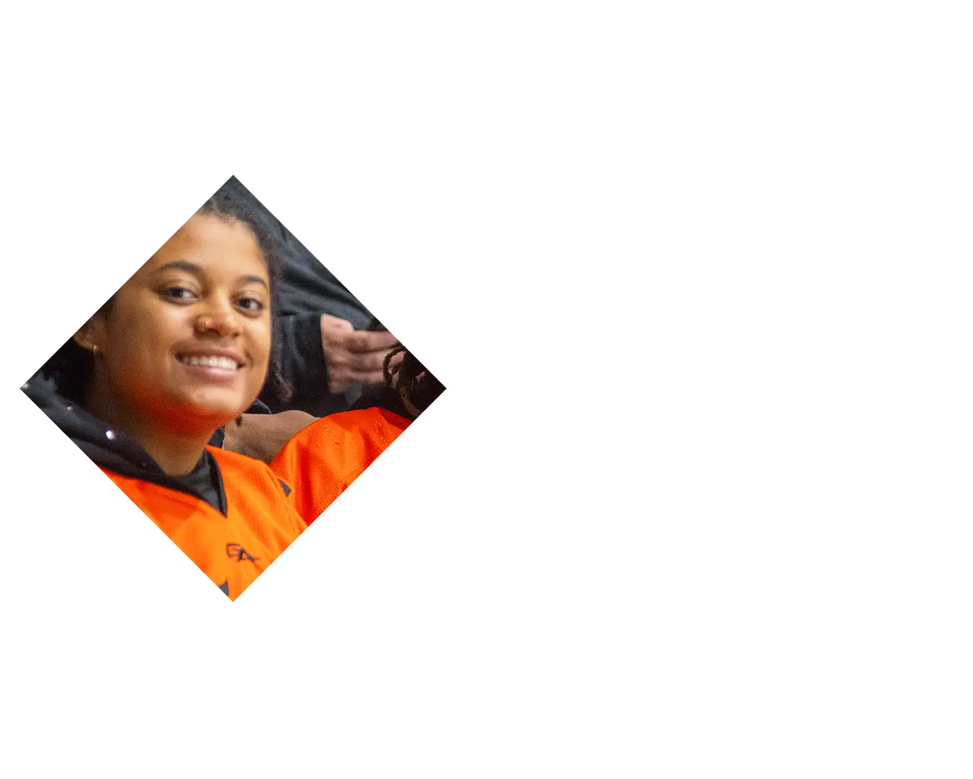 RIT flared people showing a peace sign to the camera while smiling