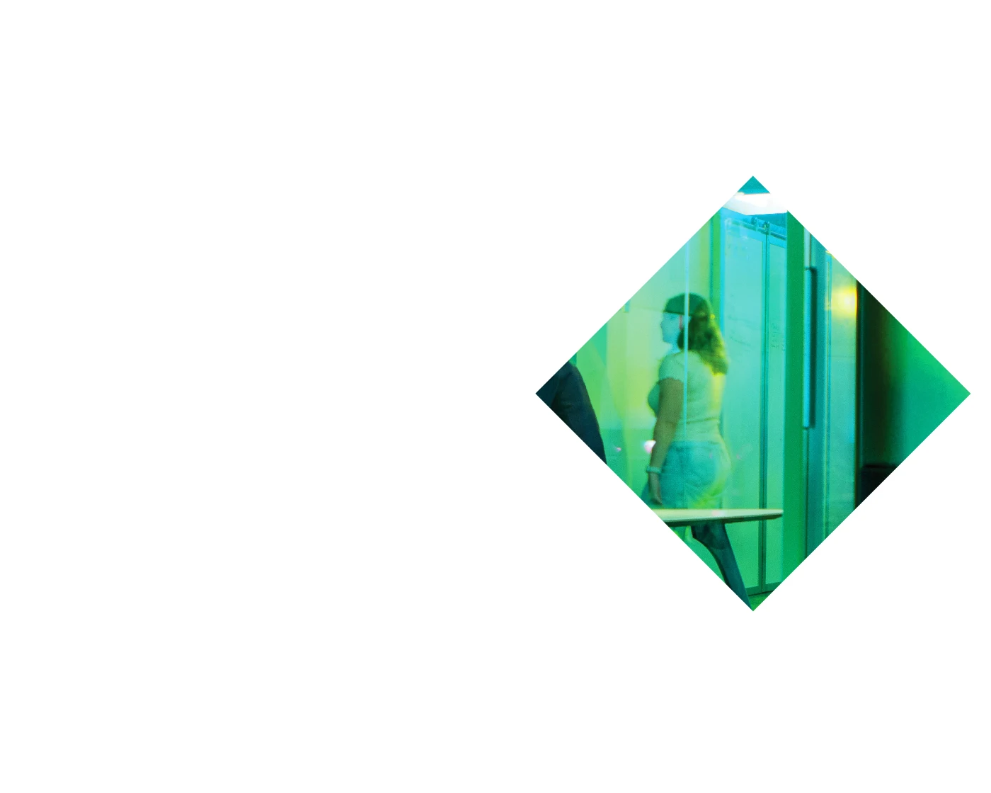 green tinted background of a group of people working on something