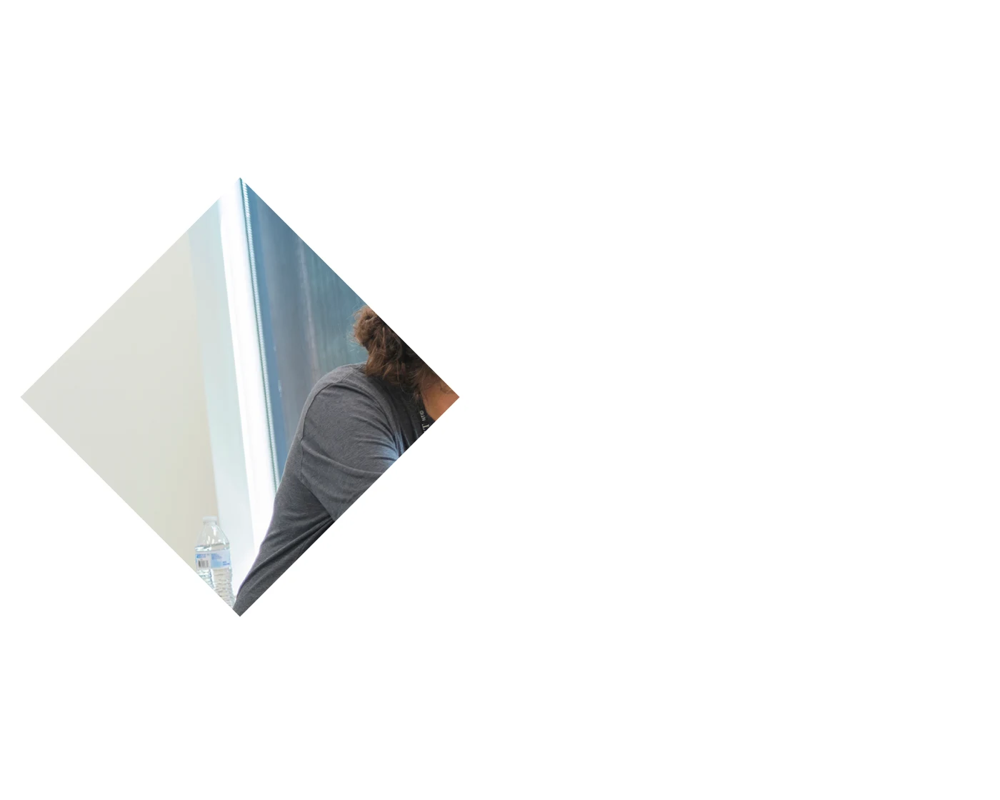 Two people signing ASL to each other