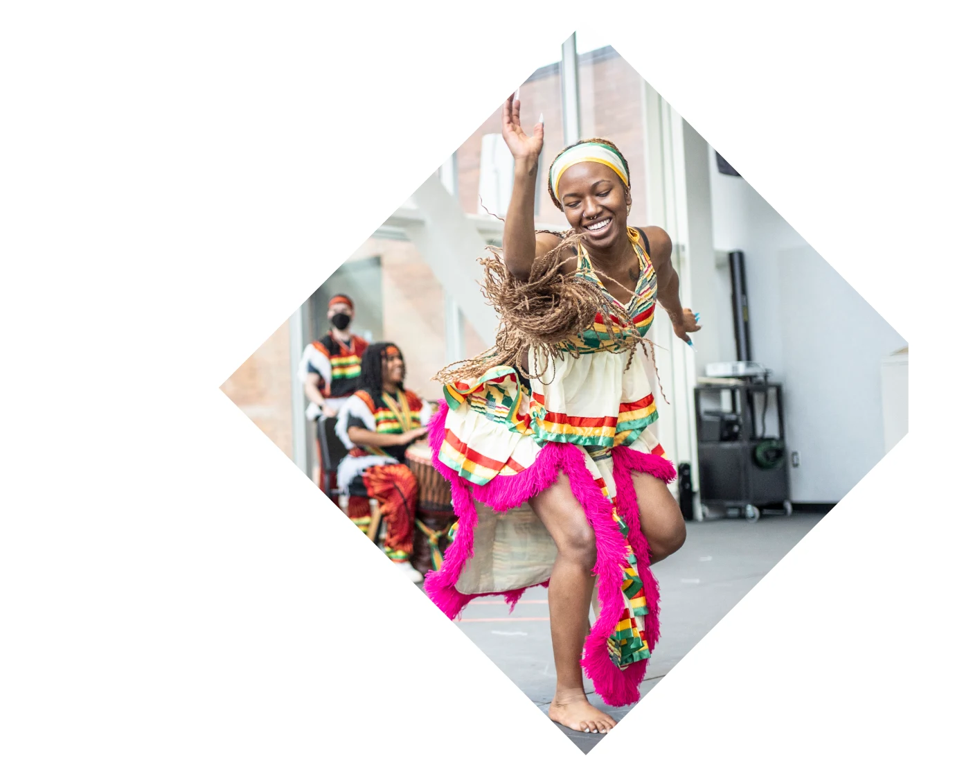 Woman dancing in colorful clothes