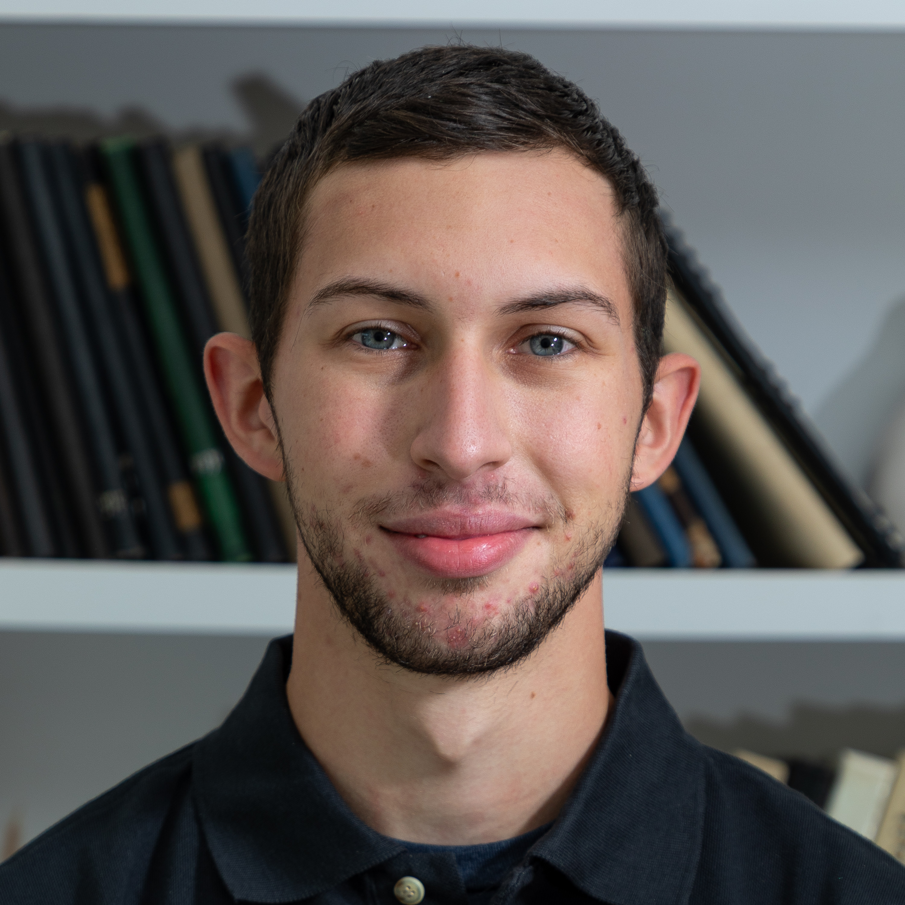 Headshot of Damian Hacke.