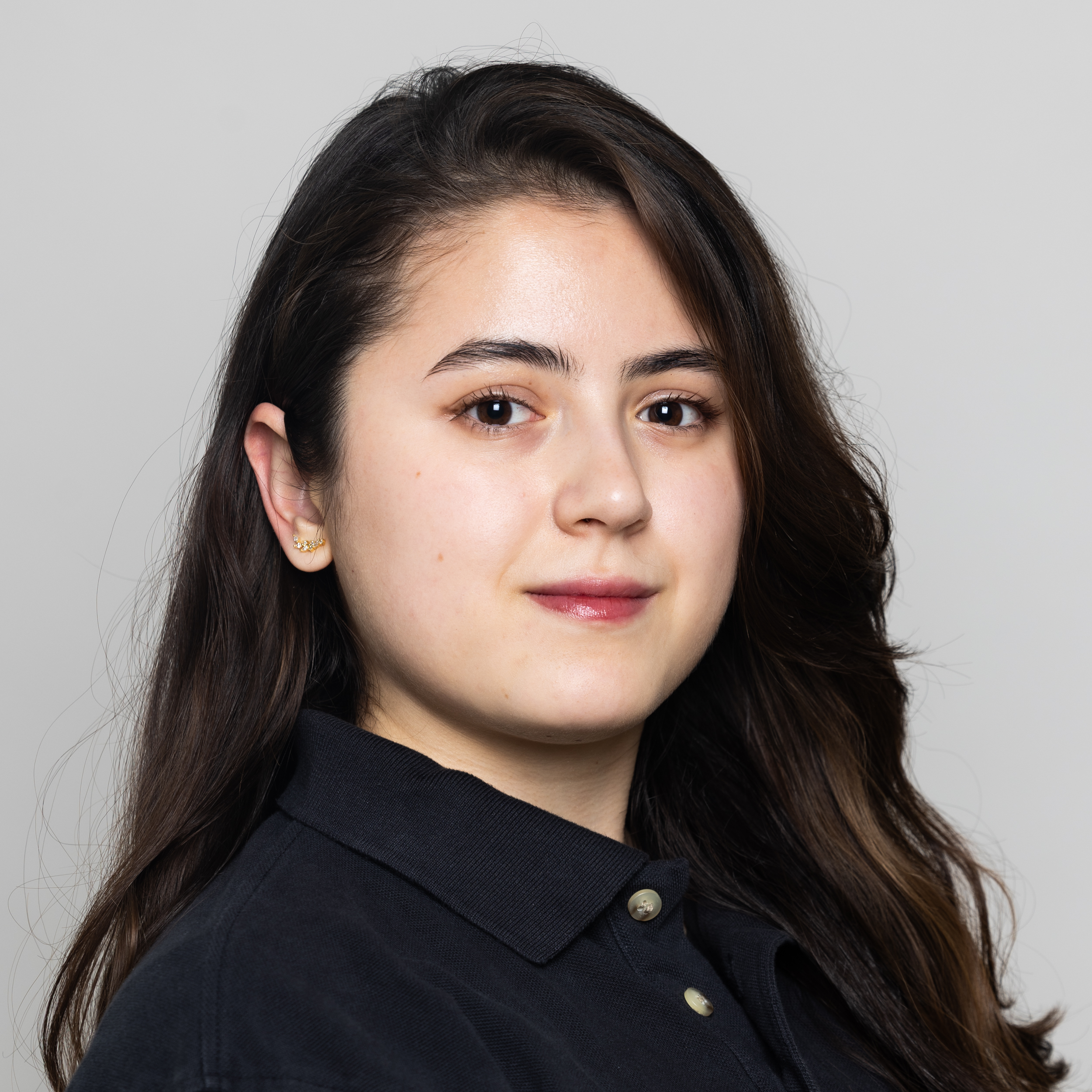 Headshot of Amina Atabaeva.