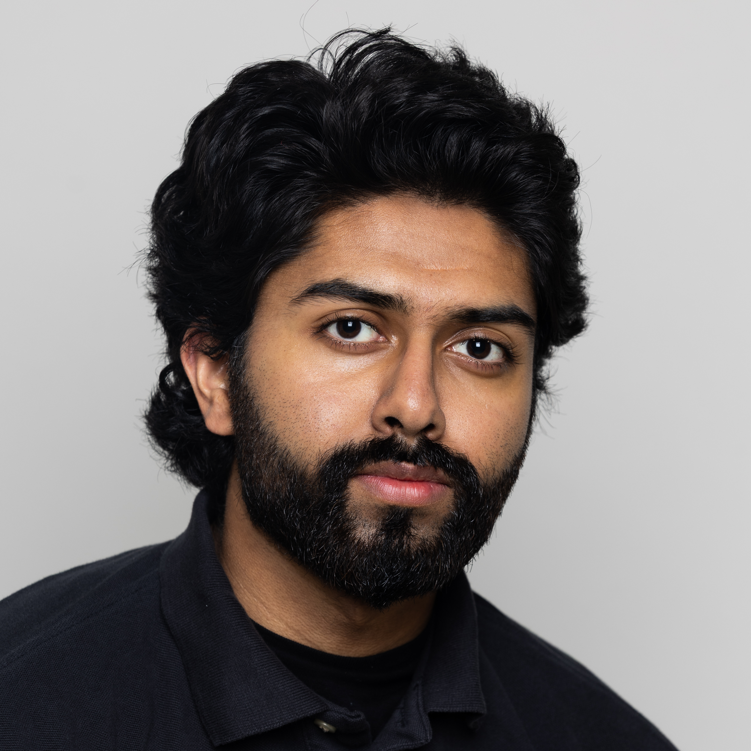 Headshot of Hasaan Bodlah.