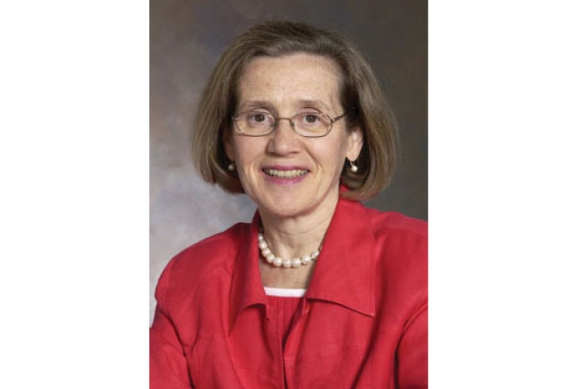 RIT director posing for camera