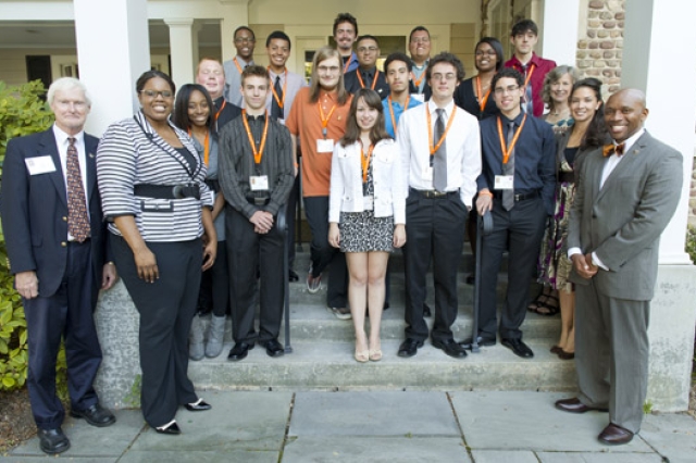 People gathered around the entrance to building