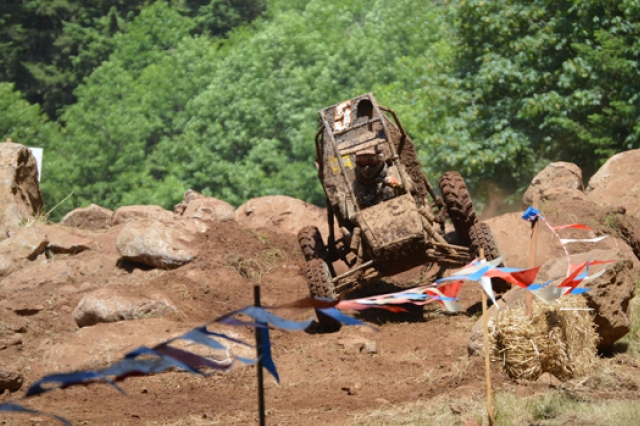 Picture of kart driving along dirt course