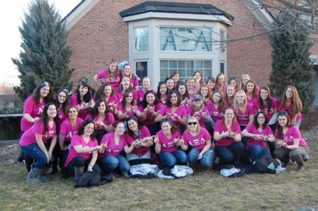People gathered in front of house