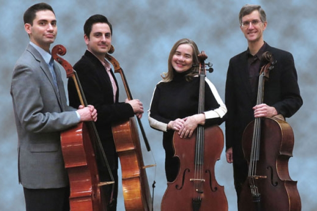 People posing with wind instruments