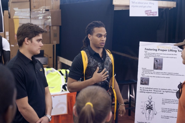 Student explaining presentation