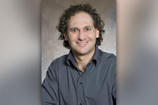 Professor posing for camera