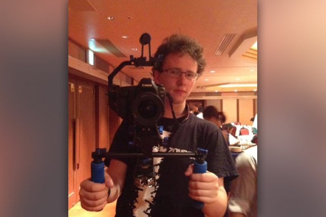 Person holding camera device